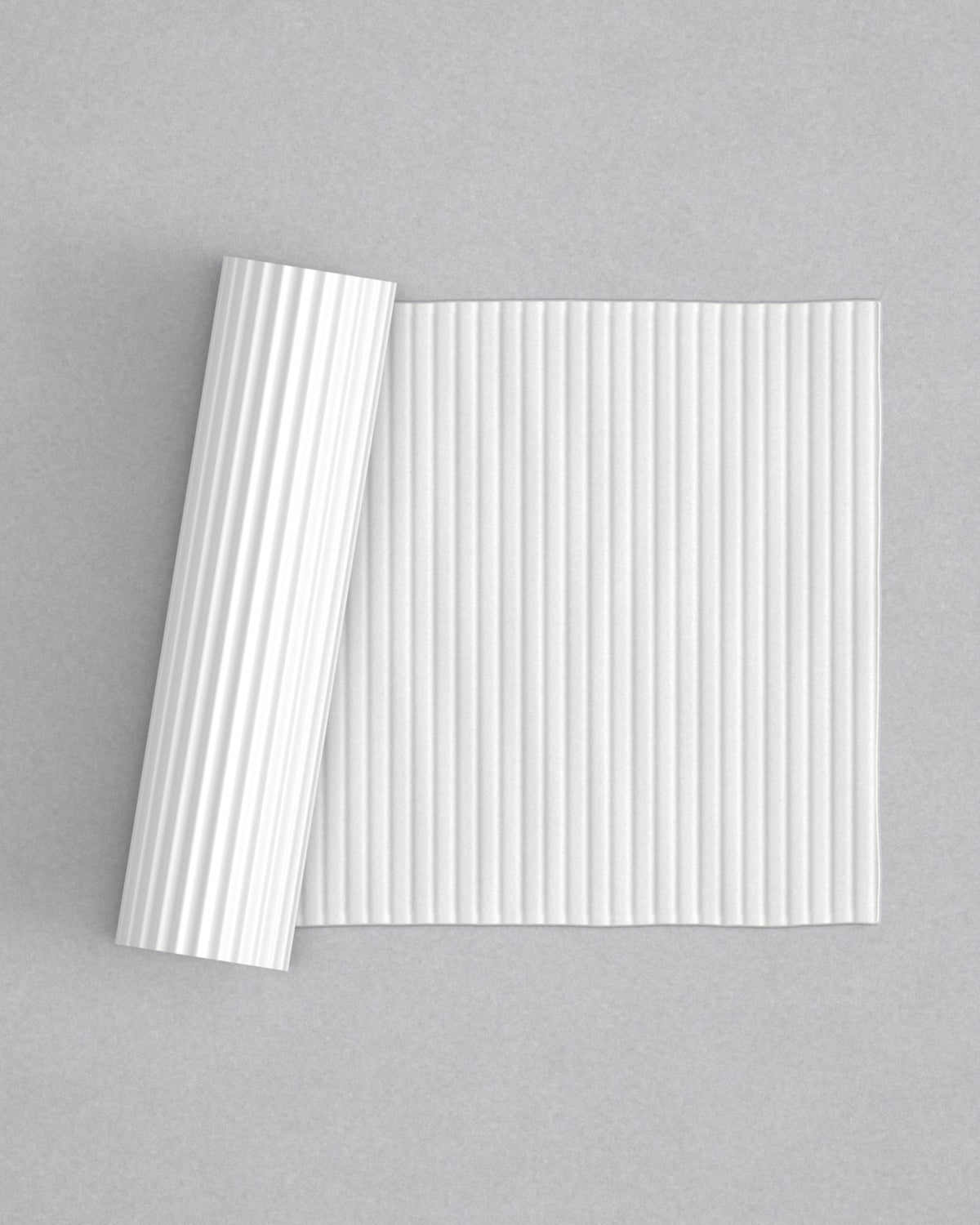 No.12 Wide Reed mini 4" texture rolling pin with its pattern rolled out on white fondant - Prop Options