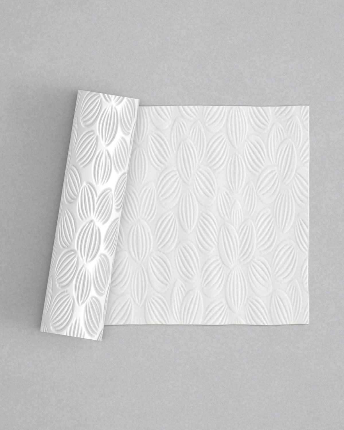 No.32 Pettula mini 4" texture rolling pin with its pattern rolled out on white fondant - Prop Options