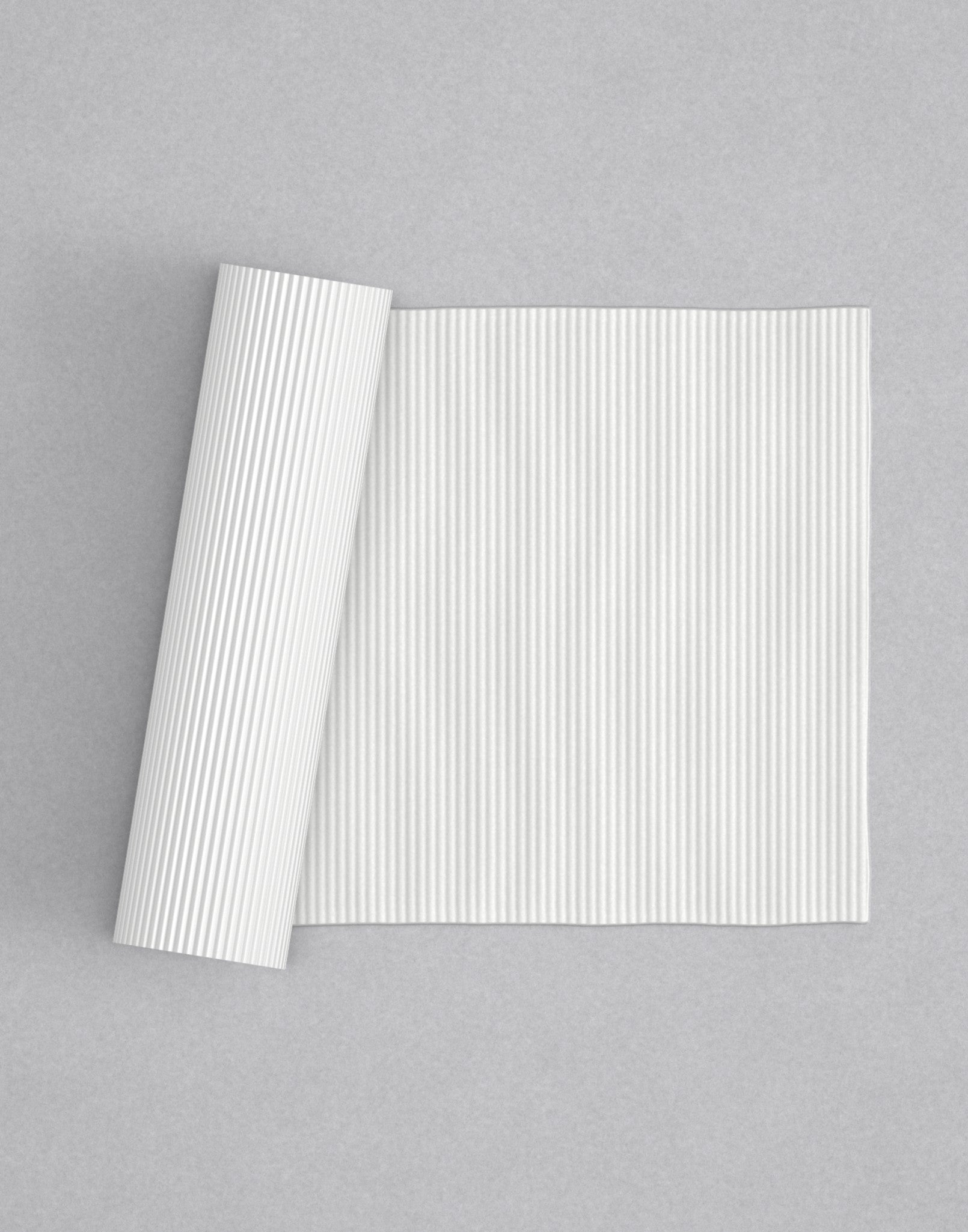 No.10 Fine Reed mini 4" texture rolling pin with its pattern rolled out on white fondant - Prop Options