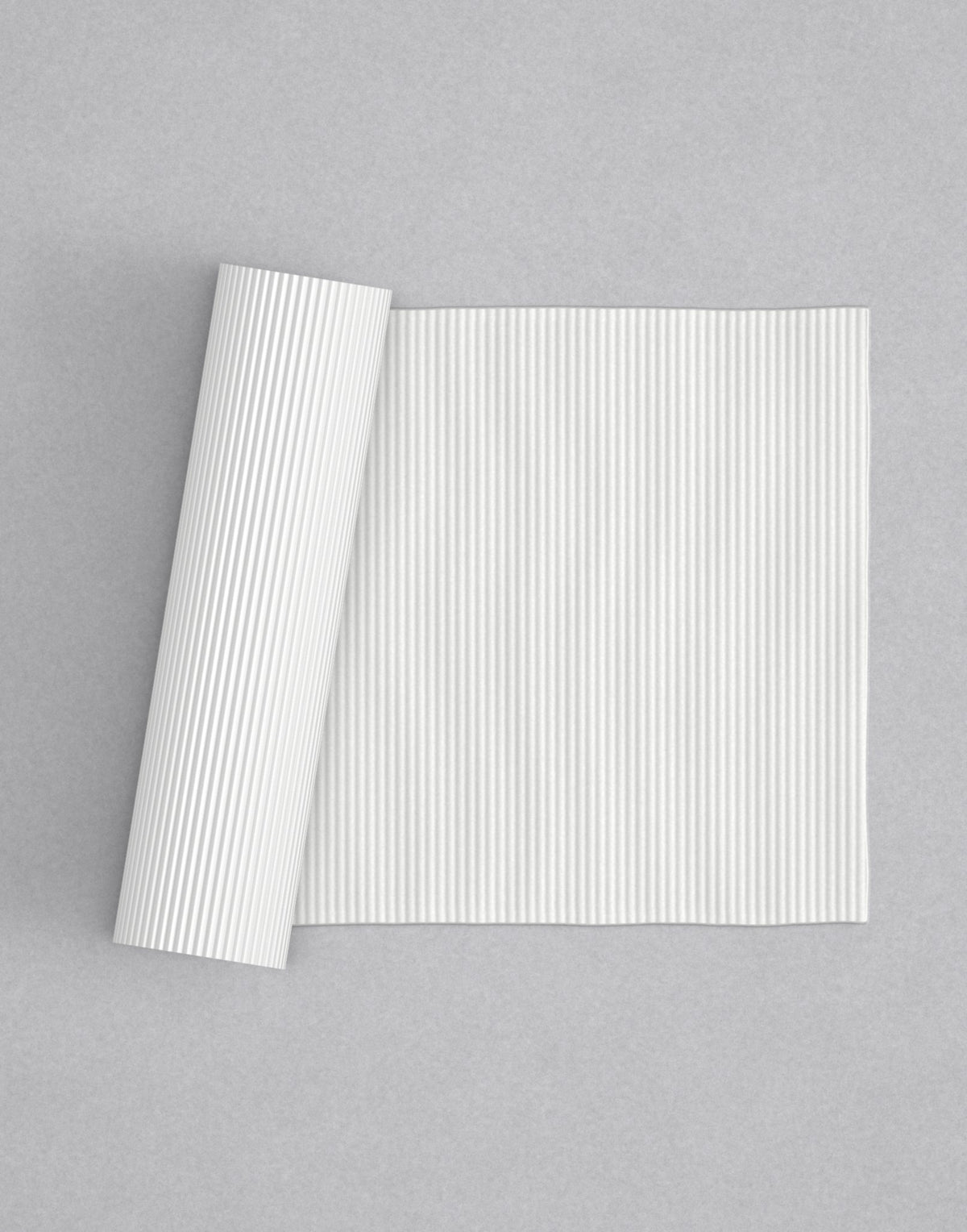 No.10 Fine Reed mini 4" texture rolling pin with its pattern rolled out on white fondant - Prop Options