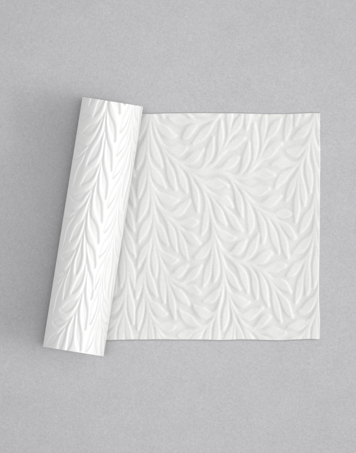 No.21 Olive mini 4" texture rolling pin with its pattern rolled out on white fondant - Prop Options