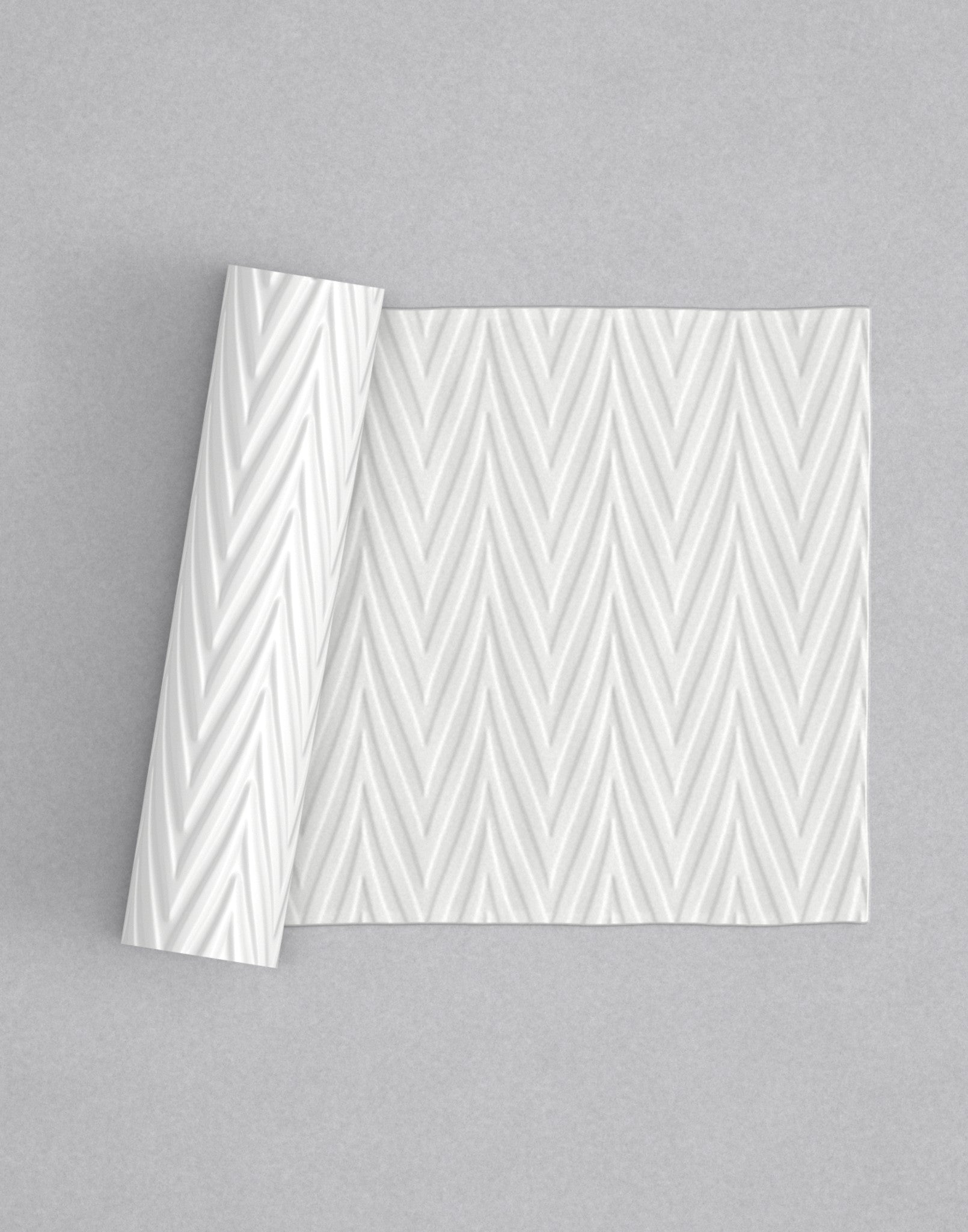 No.31 Zigzag mini 4" texture rolling pin with its pattern rolled out on white fondant - Prop Options