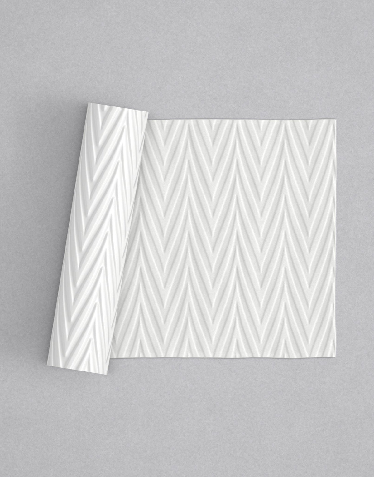 No.31 Zigzag mini 4" texture rolling pin with its pattern rolled out on white fondant - Prop Options