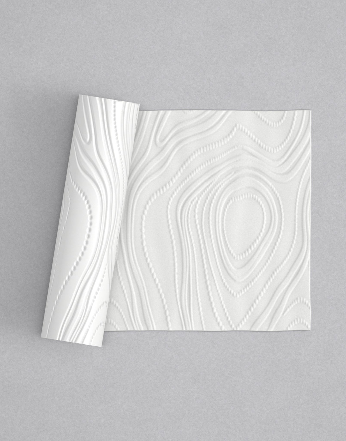 No.54 Beadrift mini 4" texture rolling pin with its pattern rolled out on white fondant - Prop Options