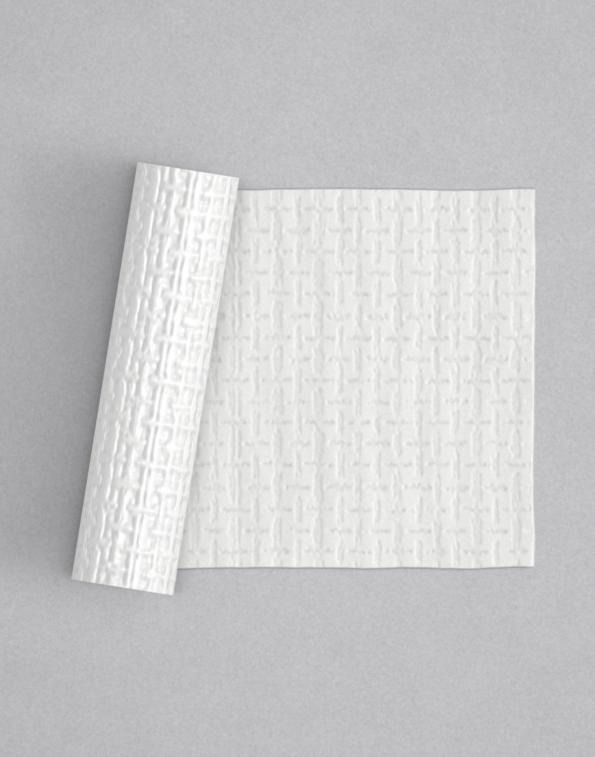 No.56 Tressix mini 4" texture rolling pin with its pattern rolled out on white fondant - Prop Options