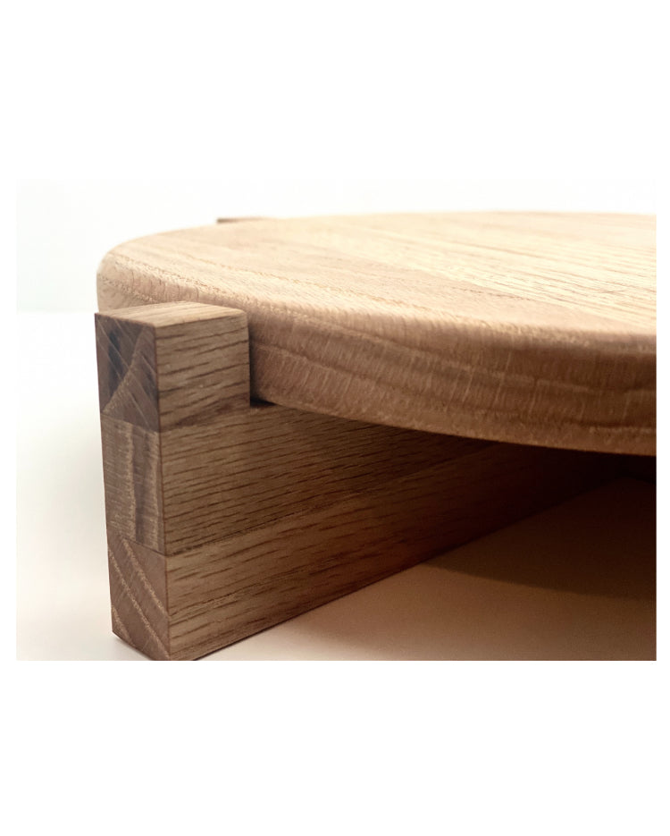 A close up of a Handcrafted Solid Oak Cake Stand - Prop Options