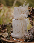 Stunning autumn themed cake using Prop Options ultra-polished acrylic cake separators - dried flowers and autumn leaves