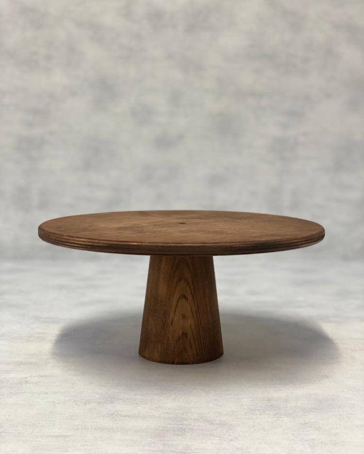 The Scandinavian Cone Birch Cake Stand standard size in a dark finish - Prop Options